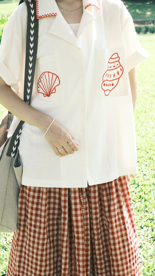 shell shirt 𓆝